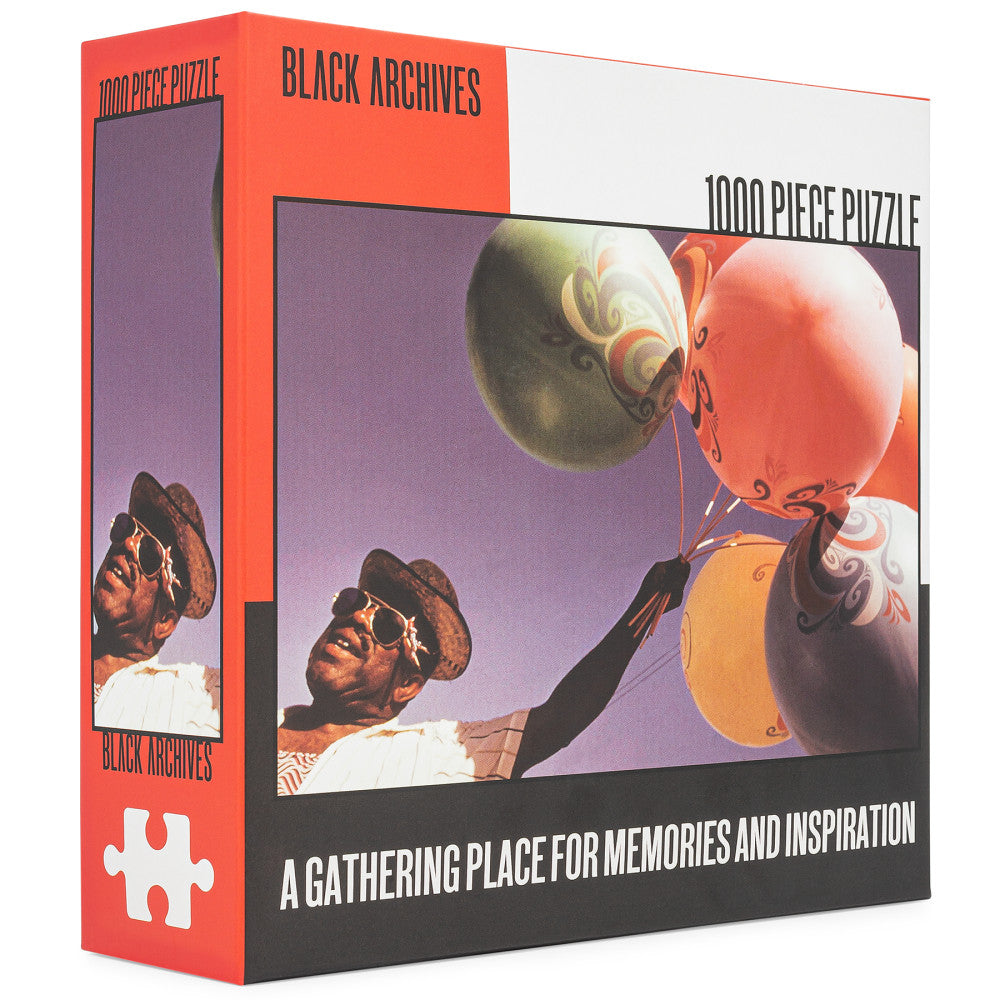 Black Archives Man With Balloons Jigsaw Puzzle - 1000 pc