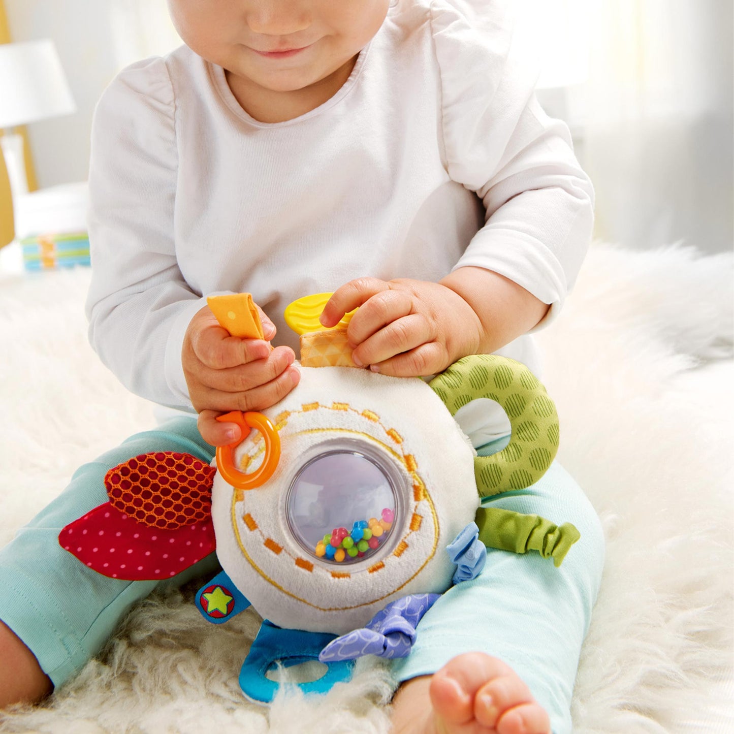 HABA Rainbow Teether Cuddly Activity Toy ‚Äì Multicolor